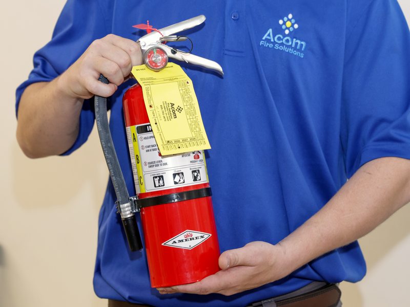 Extinguisher with Acom service tag